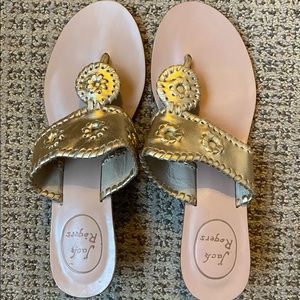 Like new gold metallic sandals. Never worn off carpet.